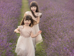 girls running in lavender