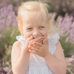 girl laughing in lavender