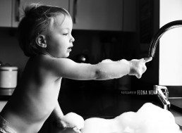 boy playing with bubbles