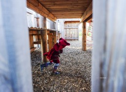 boy playing in playground dressed as pirate