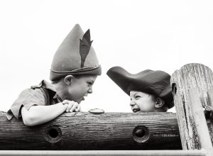brothers dressed as pirates and Peter Pan