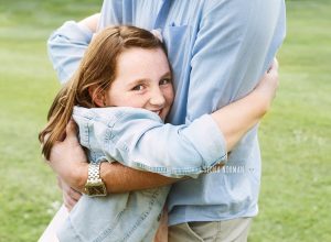 daughter hugging father